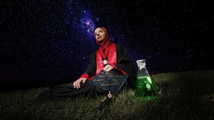 Sukaina Al-Hamedi is graduating with a degree in biochemistry. She interned with NASA and has decorated her mortar board with NASA’s mission statement: “to reach new heights and reveal the unknown”.